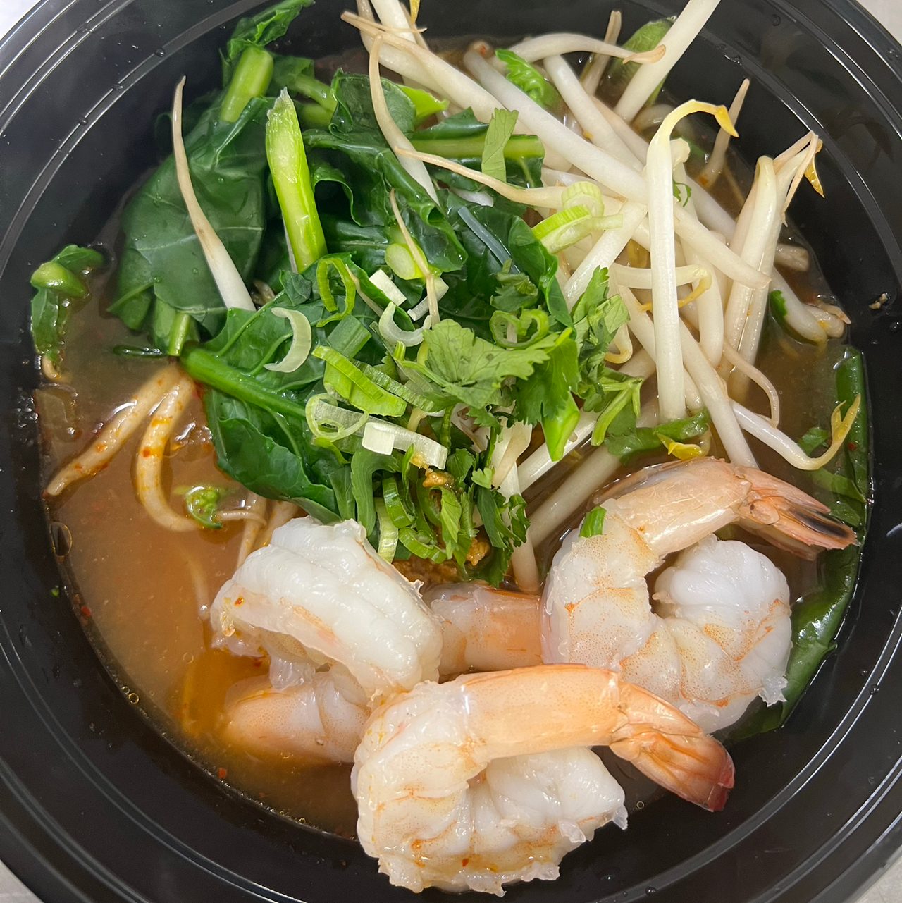 L28. Tom Yum Noodle Soup.