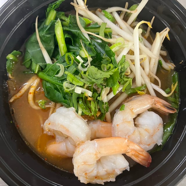 L28. Tom Yum Noodle Soup.